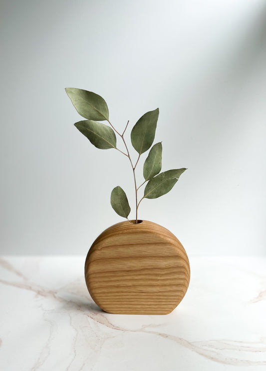 Beautiful wide circular organic wooden bud/flower vase handcrafted by Camino Woodshop available to purchase online for home decor or as a gift for friends and family